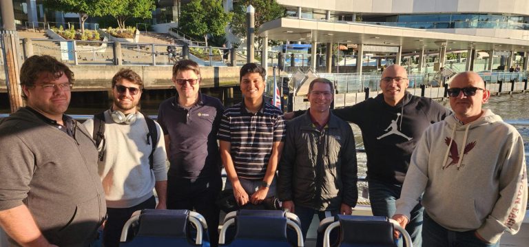 A group of staff members posing for the camera