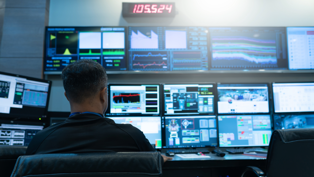 man in control room