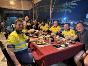 Mipac control systems engineers and other members of the project team enjoying a well-deserved group dinner in between project work in Zambia